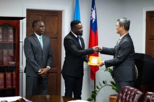 Prime Minister Philip J Pierre and Taiwan Officials while granting the funds